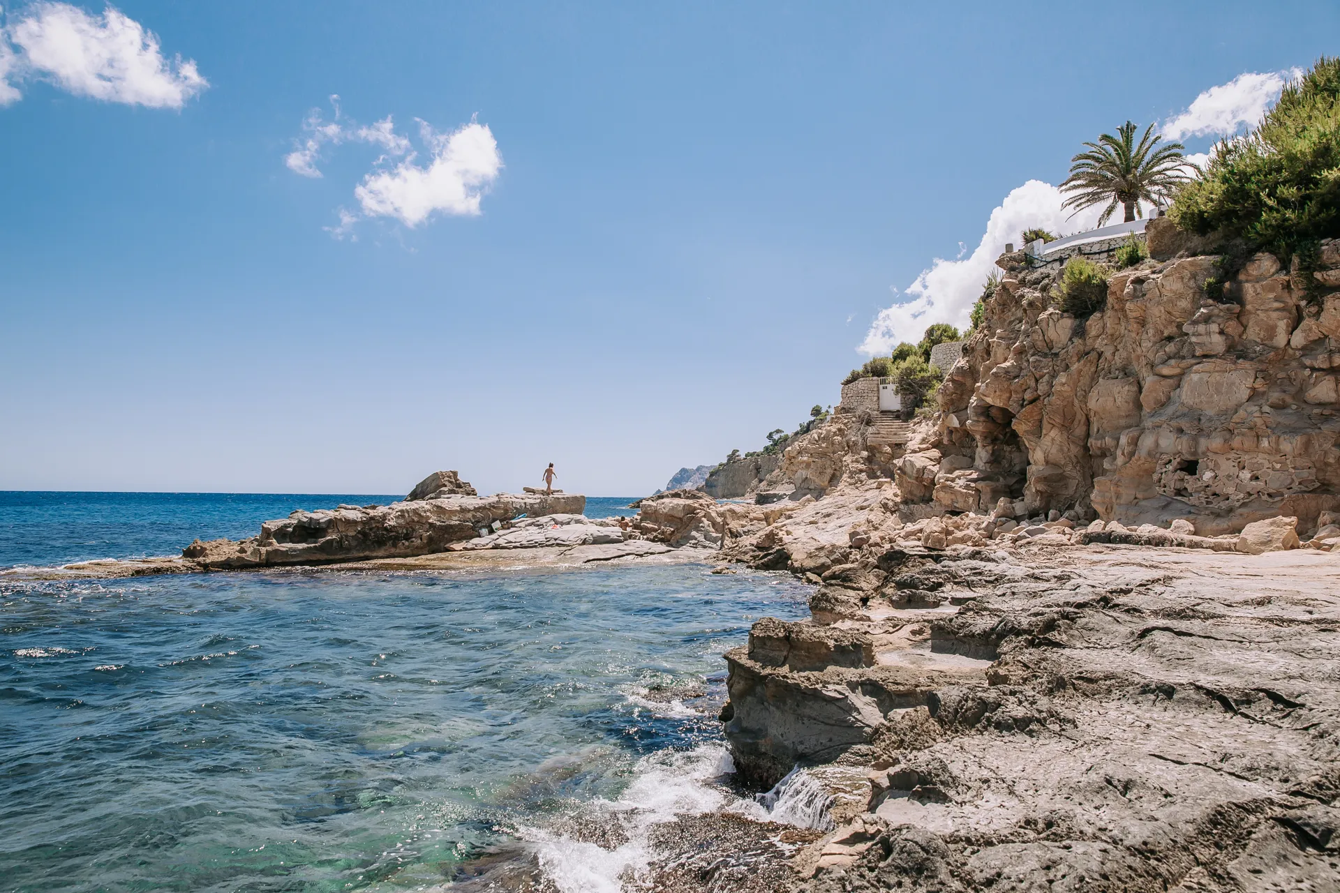 Cala Pinets cove in Benissa with rocky coastline on the Costa Blanca