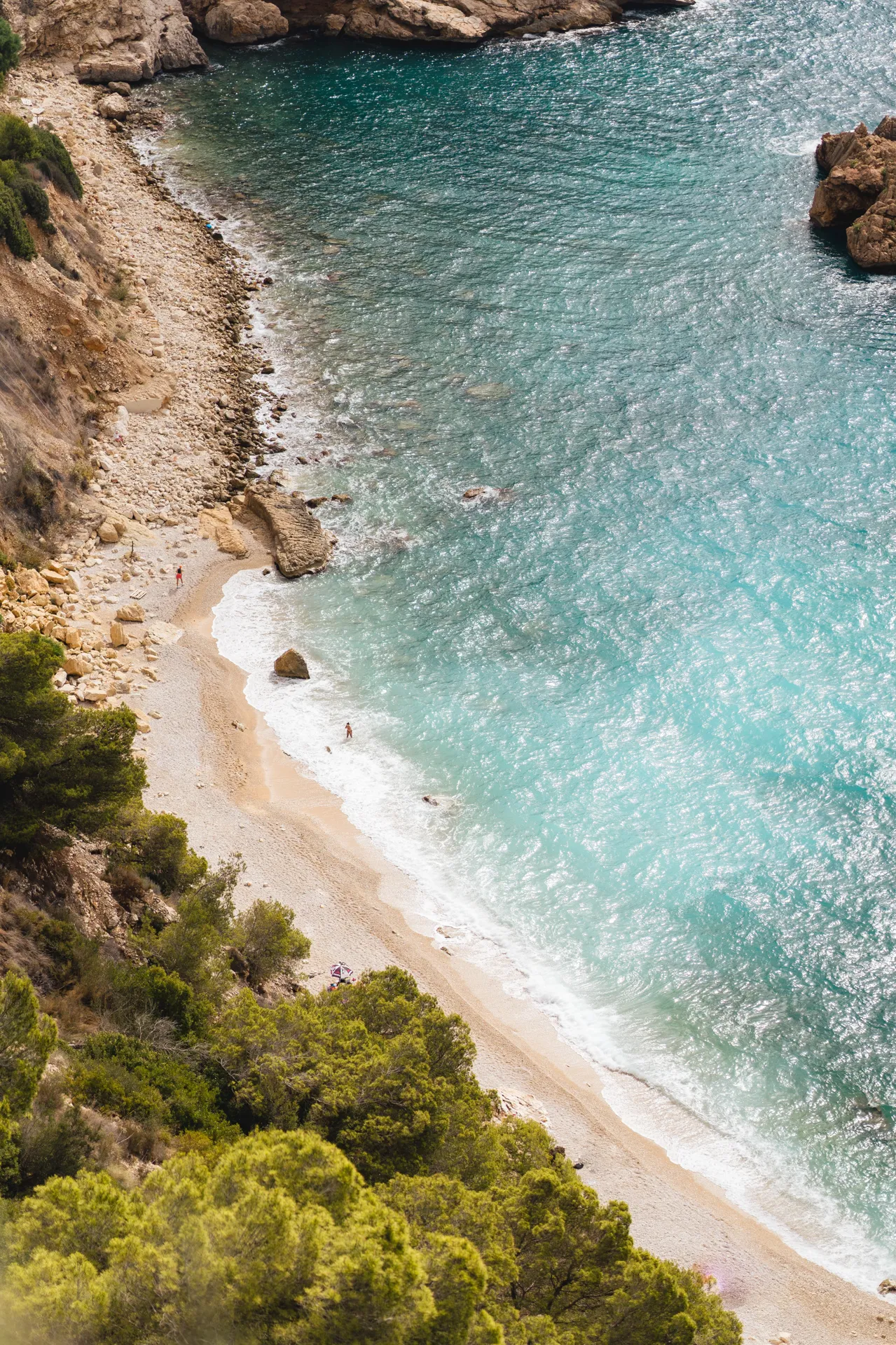 Aerial view of sandy beach and turquoise sea on the Costa Blanca